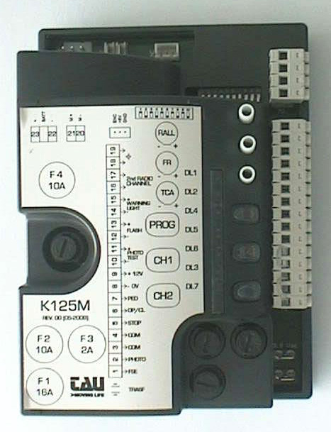 Platine de commande TAU K125M avec borniers, fusibles, dip-switches et boutons RALL, FR, TCA, PROG, CH1, CH2