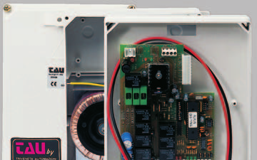 Armoire de commande MEC 1000-2000 ouverte montrant le transformateur toroïdal et la carte électronique